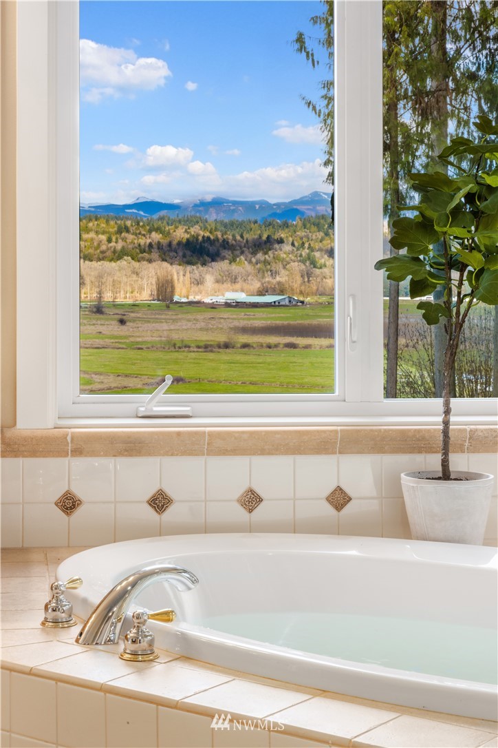 8707 West Snoqualmie Valley Road Northeast Carnation, WA 98014 - Photo 28 of 39 a view of a sink and a table