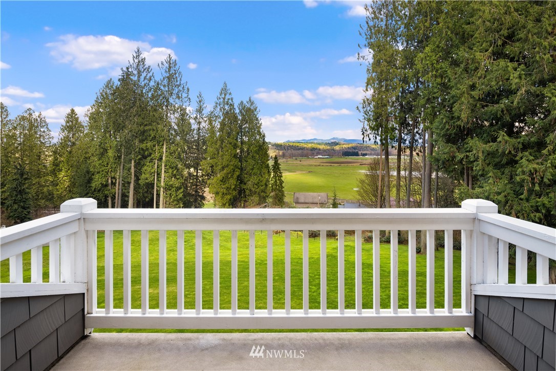 8707 West Snoqualmie Valley Road Northeast Carnation, WA 98014 - Photo 29 of 39 a view of a large white roof with a lake view
