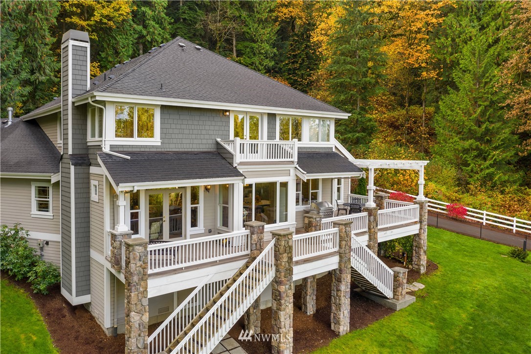8707 West Snoqualmie Valley Road Northeast Carnation, WA 98014 - Photo 39 of 39 a front view of a house with a yard