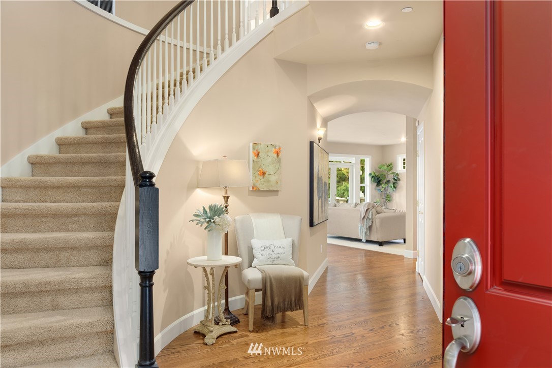 8707 West Snoqualmie Valley Road Northeast Carnation, WA 98014 - Photo 10 of 39 a view of a living room and dining room