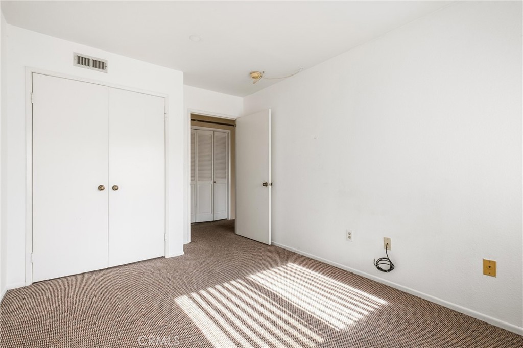 14429 Chardon Avenue, Unit 41 Hawthorne, CA 90250 - Photo 17 of 27 a view of a closet area with ceiling fan
