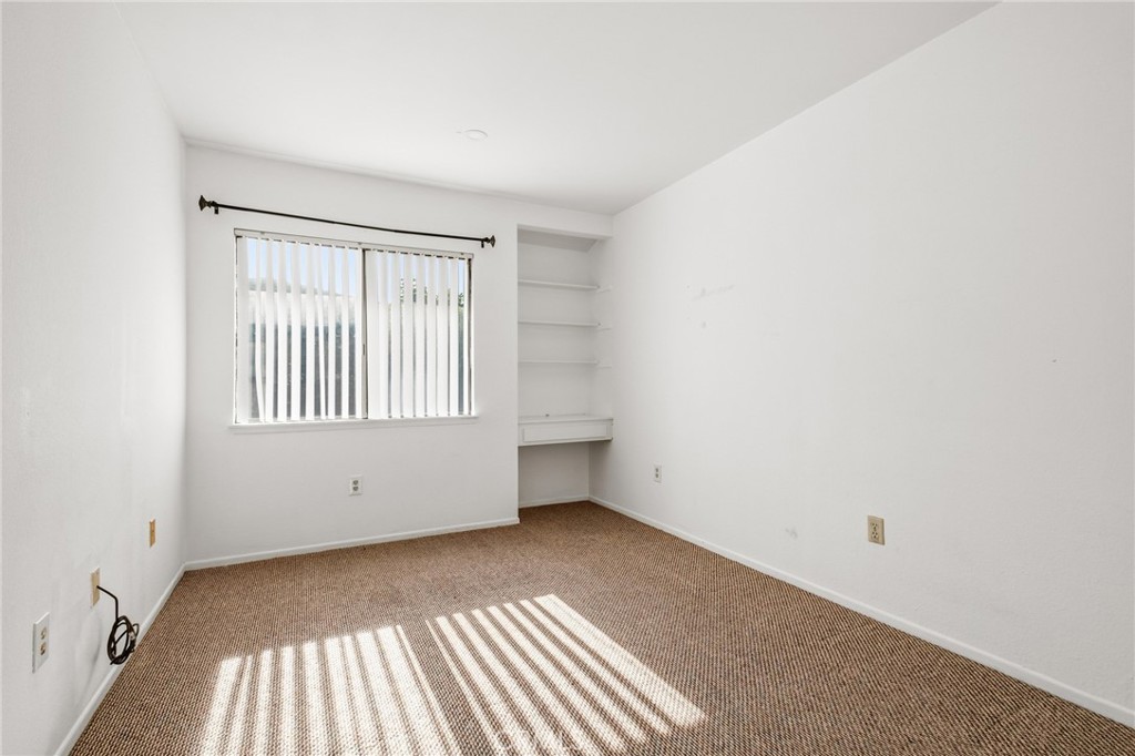 14429 Chardon Avenue, Unit 41 Hawthorne, CA 90250 - Photo 18 of 27 an empty room with a window