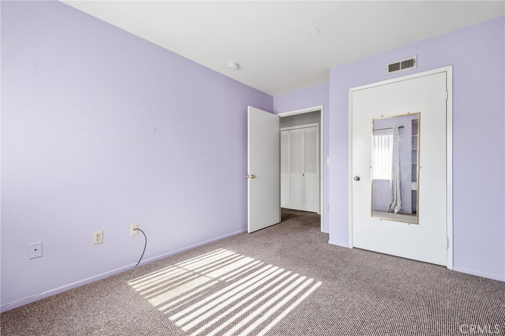 14429 Chardon Avenue, Unit 41 Hawthorne, CA 90250 - Photo 19 of 27 a view of a room with wooden floor and bathroom