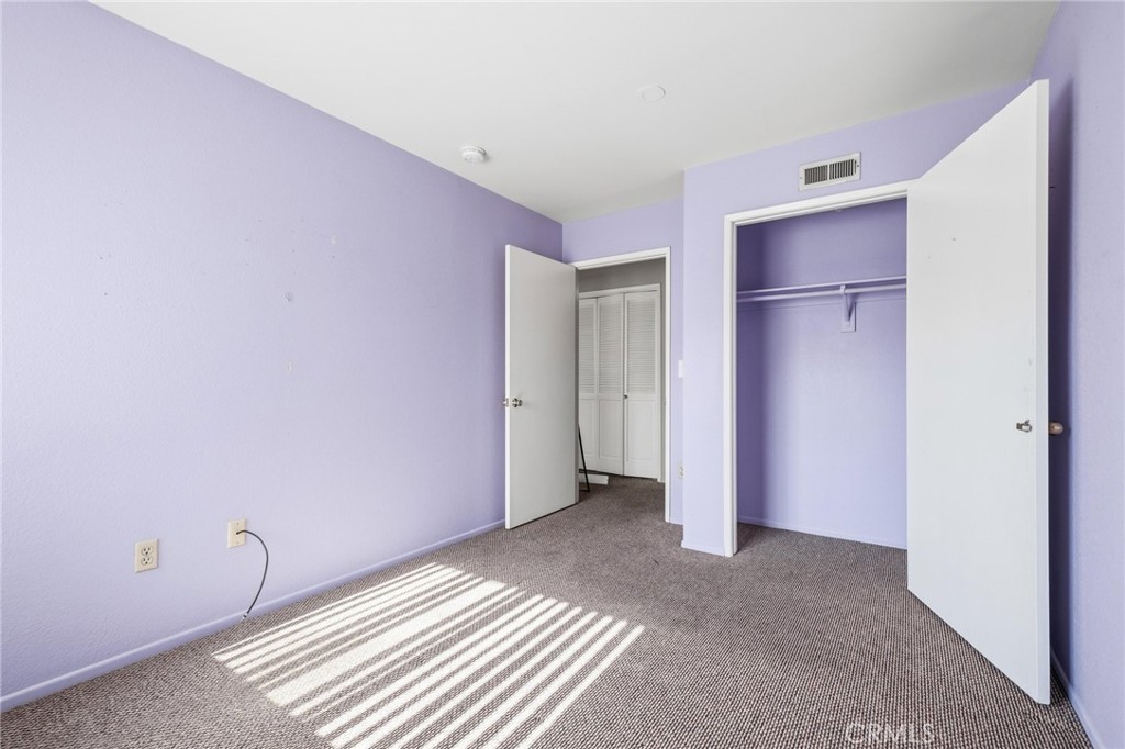 14429 Chardon Avenue, Unit 41 Hawthorne, CA 90250 - Photo 20 of 27 a view of a livingroom with a dishwasher and a refrigerator
