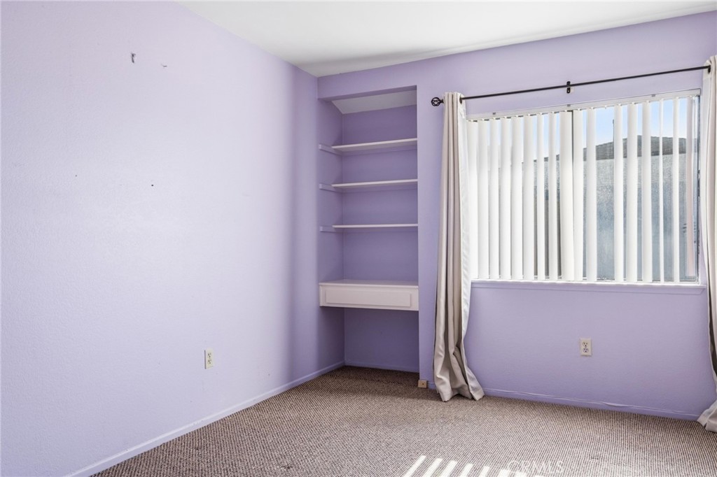 14429 Chardon Avenue, Unit 41 Hawthorne, CA 90250 - Photo 21 of 27 an empty room with a empty space
