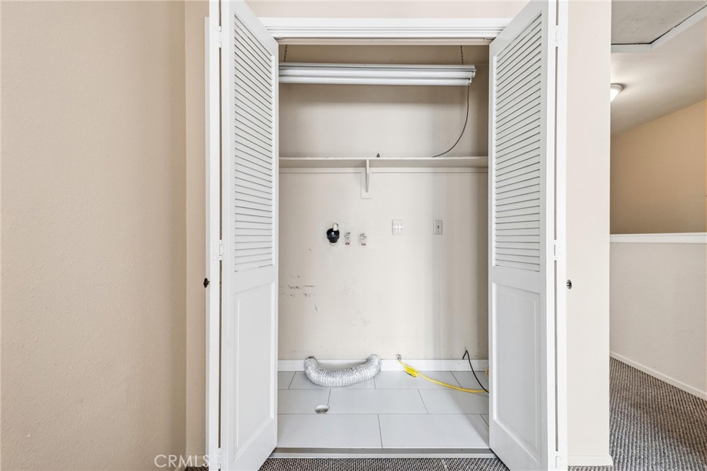 14429 Chardon Avenue, Unit 41 Hawthorne, CA 90250 - Photo 23 of 27 a bathroom with a toilet and a shower