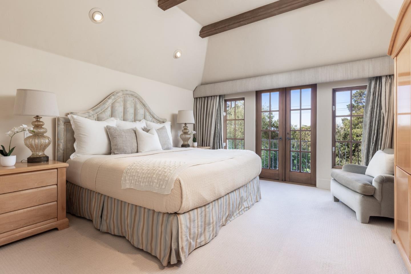 0 Southeast Corner Of Monte Verde & 10th Avenue Carmel, CA 93921 - Photo 17 of 24 a bedroom with a bed and a large window