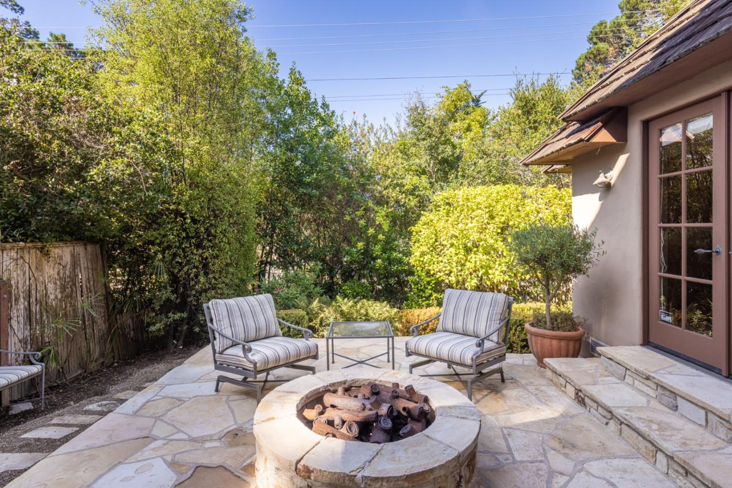 0 Southeast Corner Of Monte Verde & 10th Avenue Carmel, CA 93921 - Photo 22 of 24 a backyard of a house with fire pit and outdoor seating