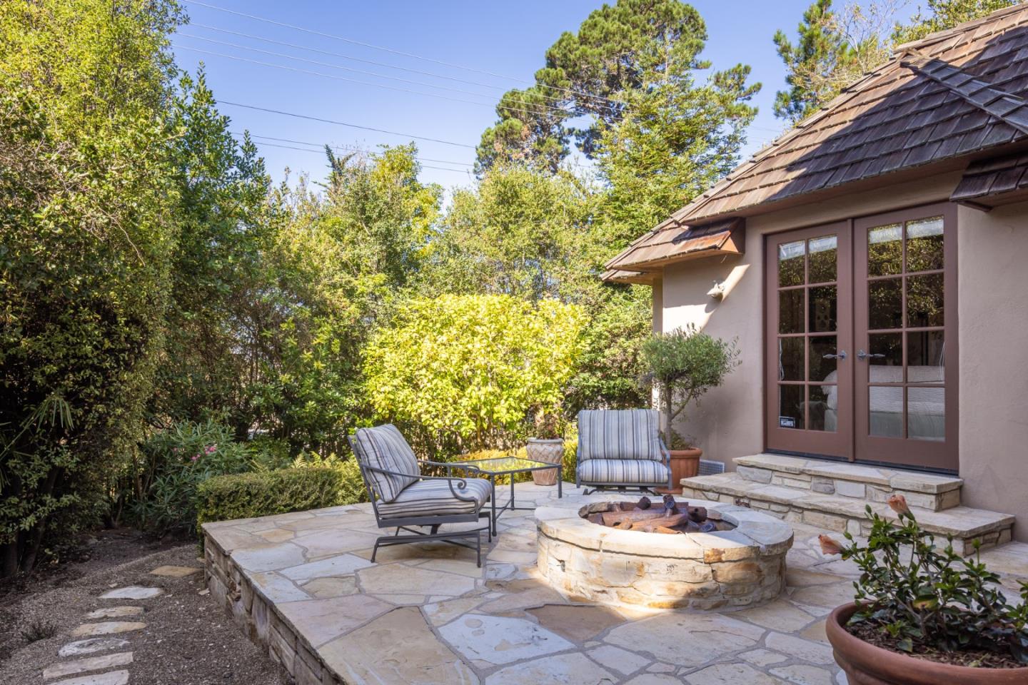 0 Southeast Corner Of Monte Verde & 10th Avenue Carmel, CA 93921 - Photo 23 of 24 a view of a patio with a chairs and potted plants