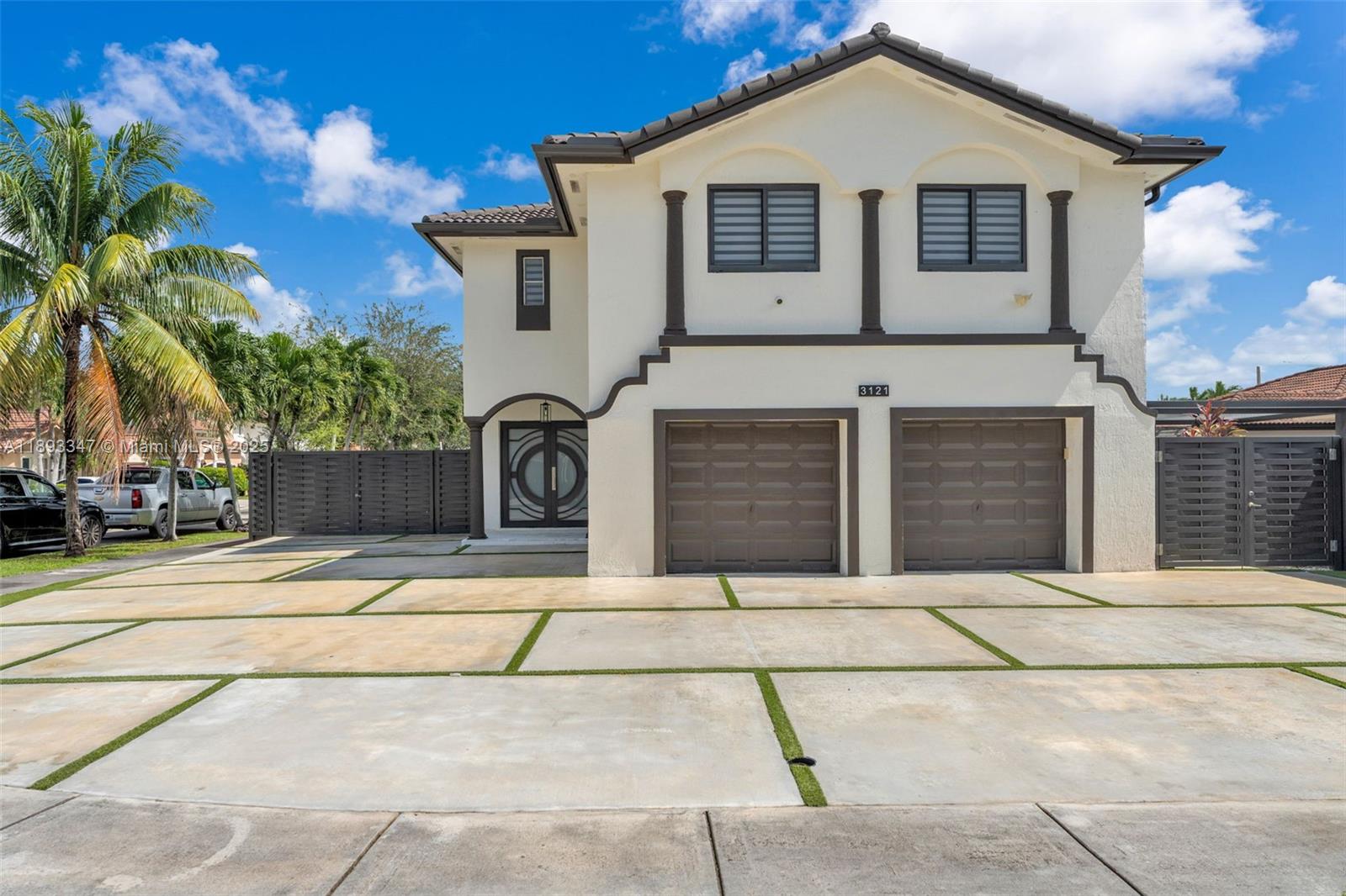 3121 Southwest 151st Court Miami, FL 33185 - Photo 1 of 37 a front view of a house with a yard