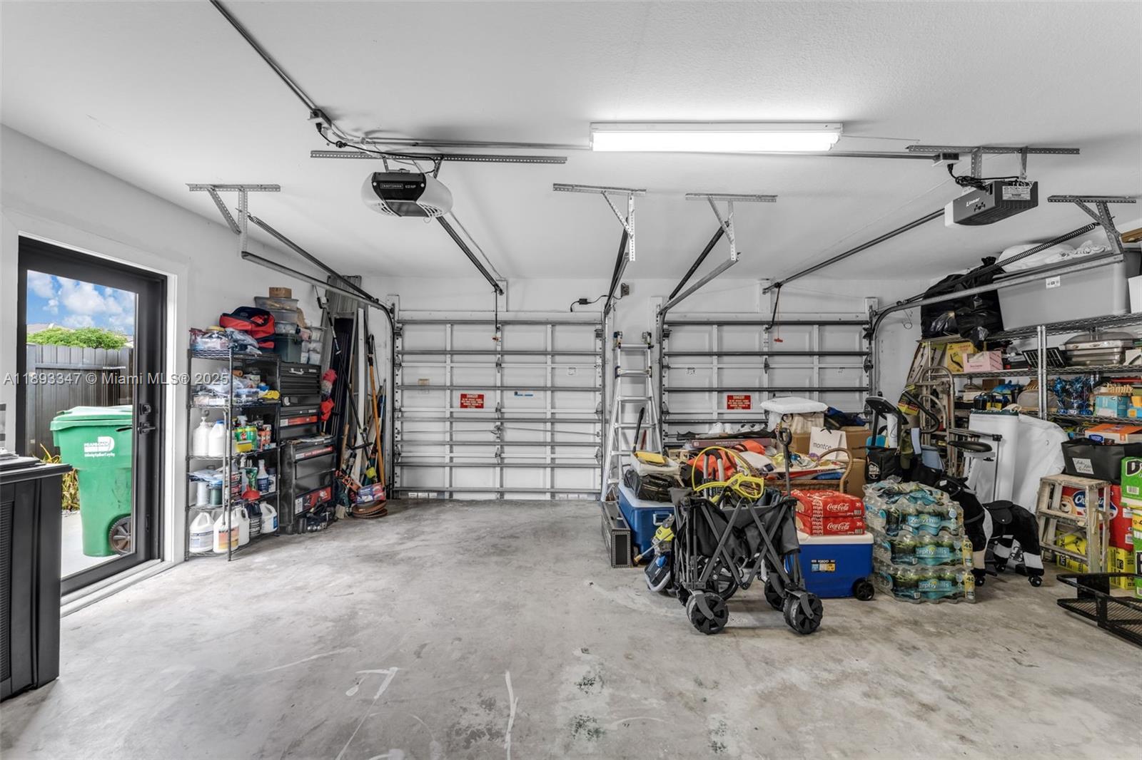 3121 Southwest 151st Court Miami, FL 33185 - Photo 14 of 37 a view of a storage room with a lot of stuff