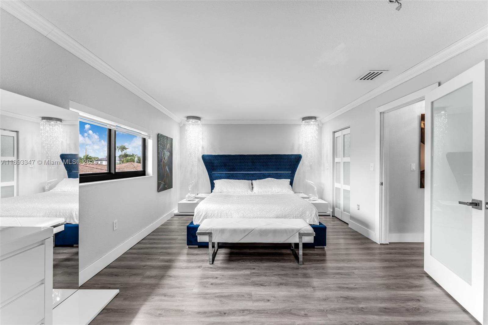 3121 Southwest 151st Court Miami, FL 33185 - Photo 16 of 37 a bedroom with a bed and a night stand