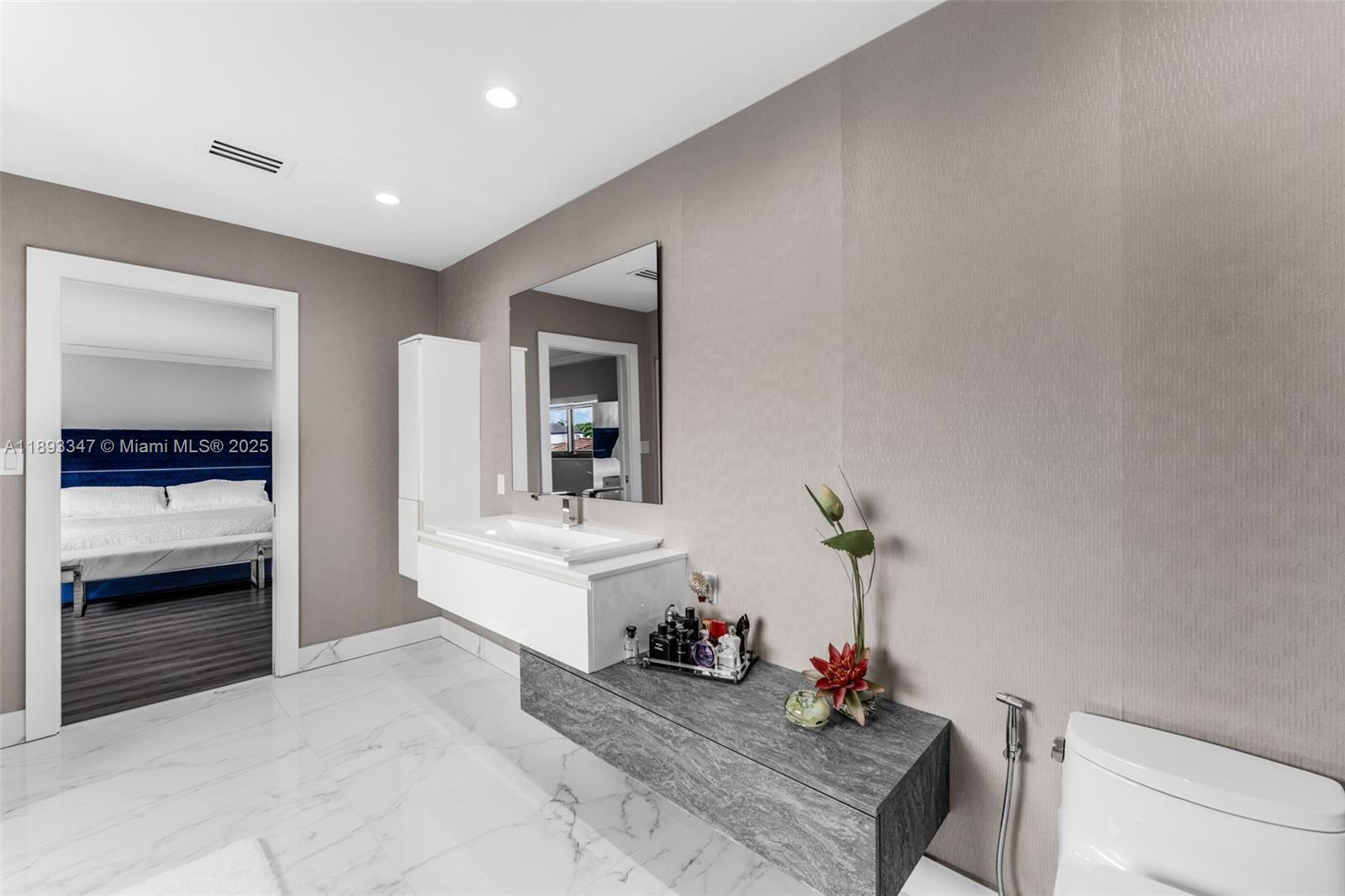 3121 Southwest 151st Court Miami, FL 33185 - Photo 19 of 37 a living room with furniture and a potted plant