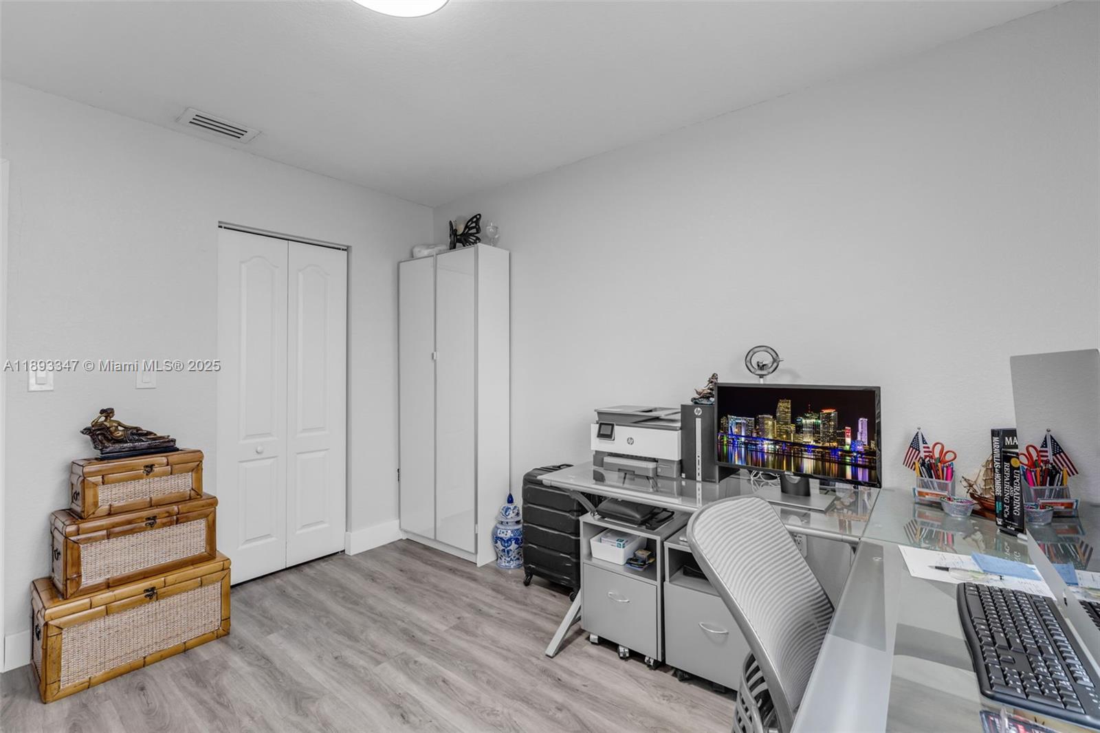 3121 Southwest 151st Court Miami, FL 33185 - Photo 25 of 37 a room with furniture and wooden floor