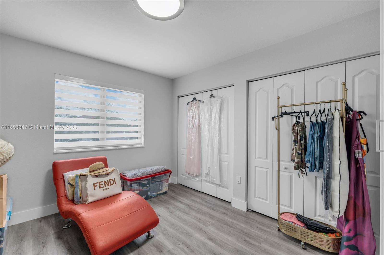 3121 Southwest 151st Court Miami, FL 33185 - Photo 26 of 37 a living room with furniture and a window