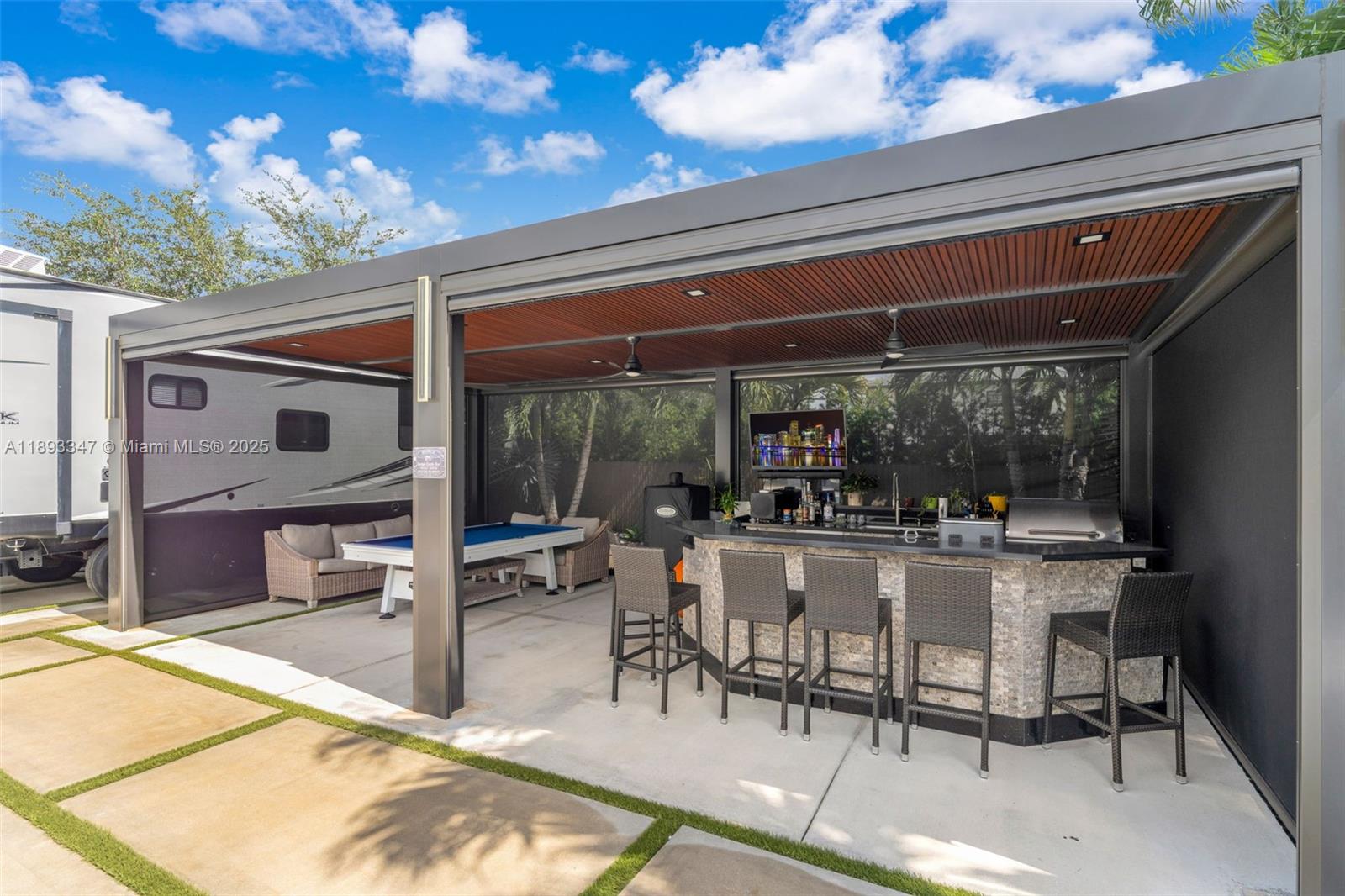 3121 Southwest 151st Court Miami, FL 33185 - Photo 27 of 37 a view of a chairs and table in a patio