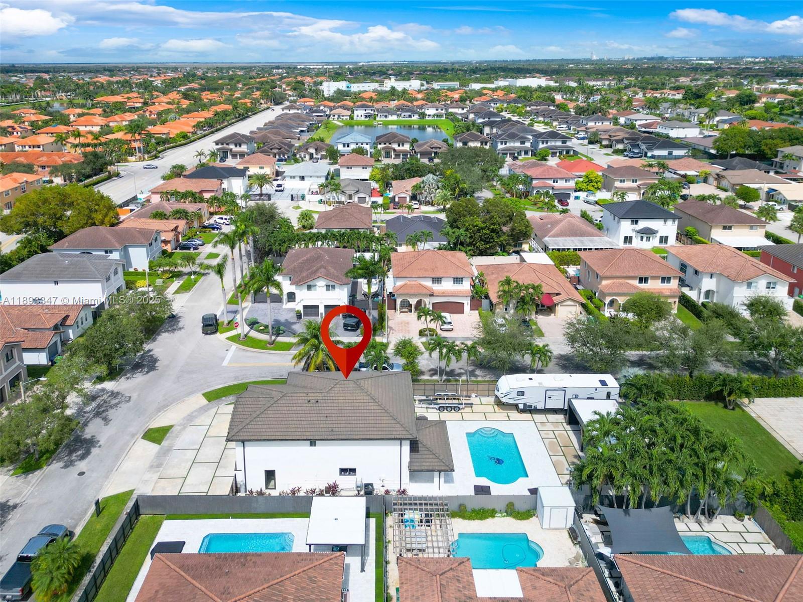 3121 Southwest 151st Court Miami, FL 33185 - Photo 35 of 37 an aerial view of residential houses with outdoor space and parking