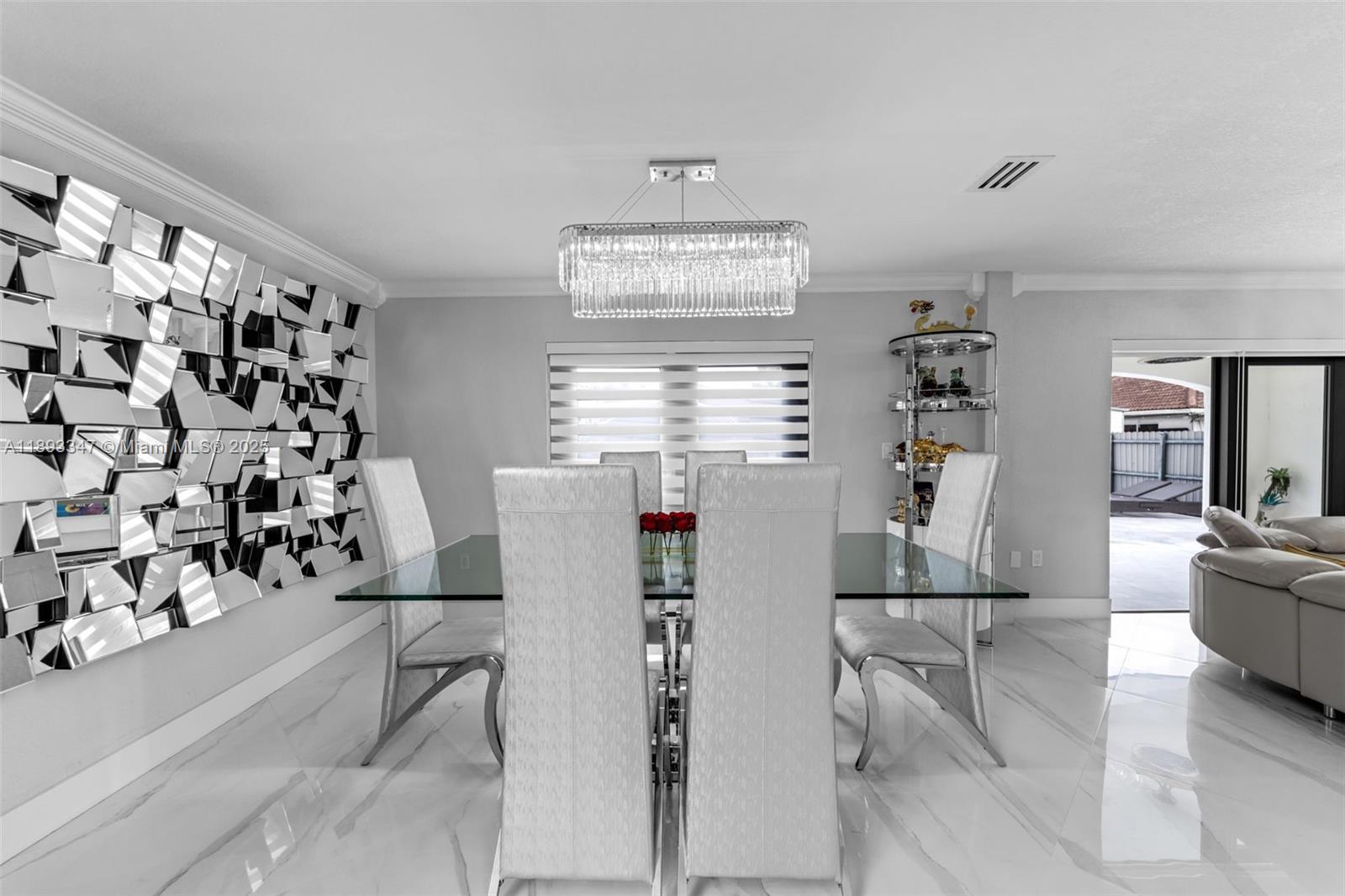 3121 Southwest 151st Court Miami, FL 33185 - Photo 8 of 37 a view of a dining room with furniture and a window