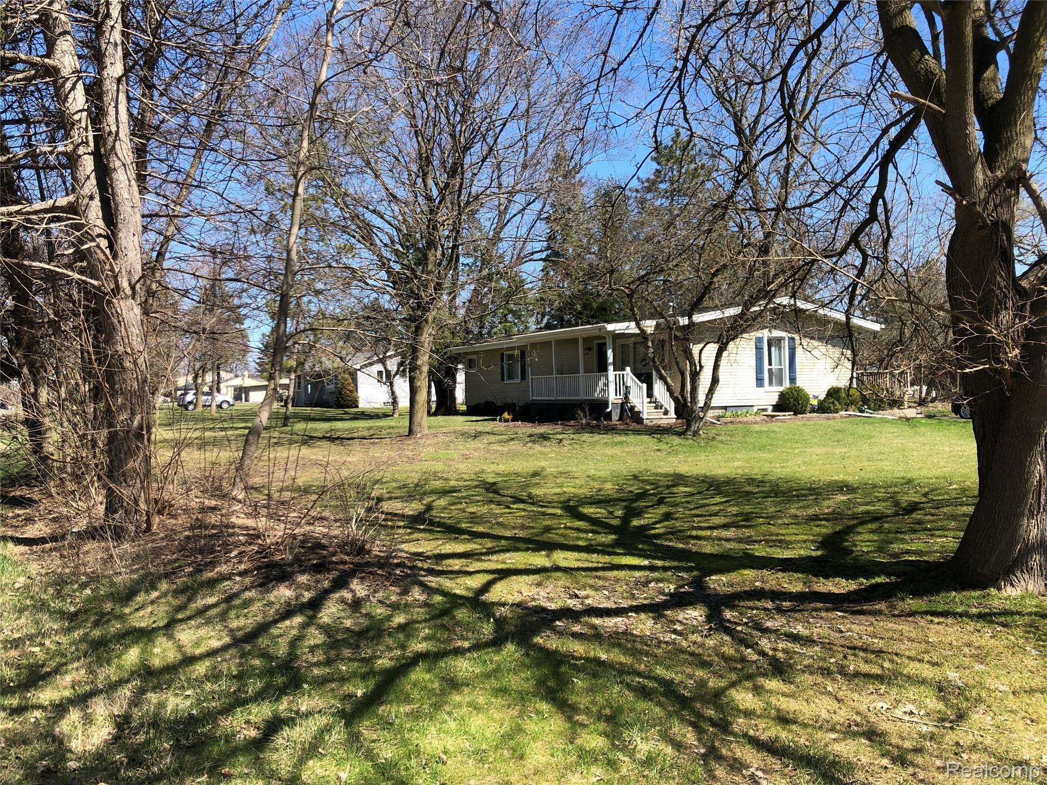 5910 North Beck Road Canton, MI 48187 - Photo 2 of 38 Home is well off the road on over half an acre!!!!