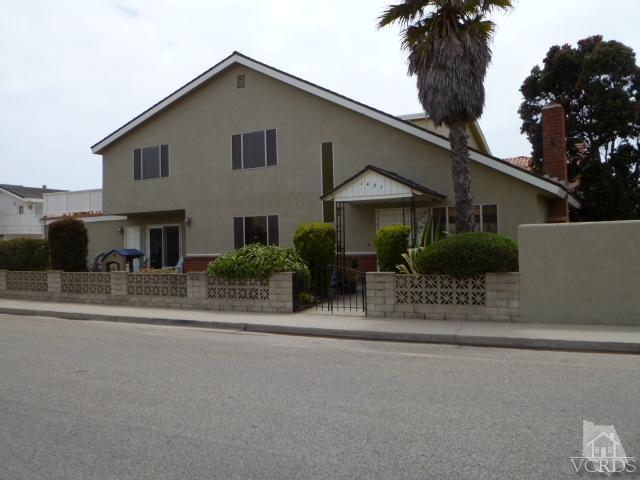 1421 Mandalay Beach Road Oxnard, CA 93035 - Photo 1 of 27 front view of a house with a street