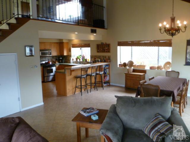 1421 Mandalay Beach Road Oxnard, CA 93035 - Photo 5 of 27 a living room with lots of furniture and kitchen view