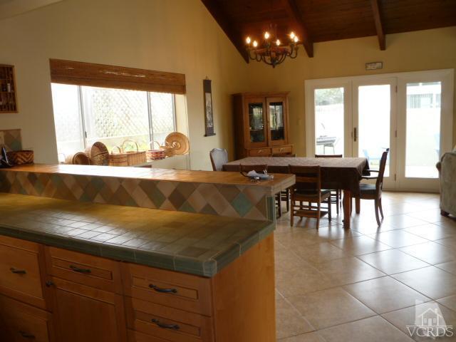 1421 Mandalay Beach Road Oxnard, CA 93035 - Photo 9 of 27 a view of a dining room with furniture and window