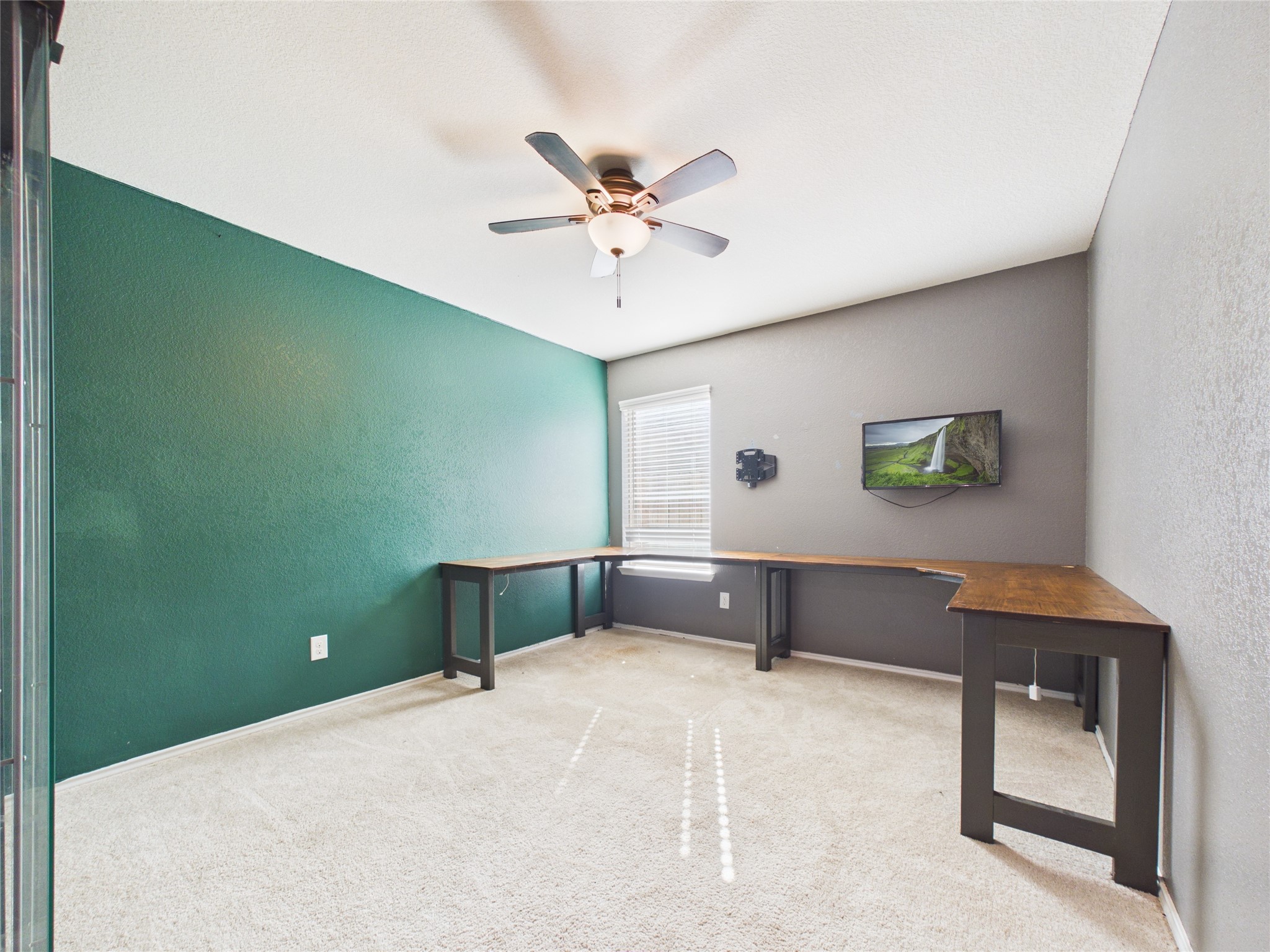1237 Steed Bluff Drive Alvin, TX 77511 - Photo 35 of 50 a bedroom with a bed and a desk