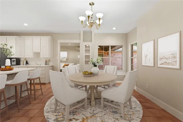 a view of a a dining room with furniture window and wooden floor
