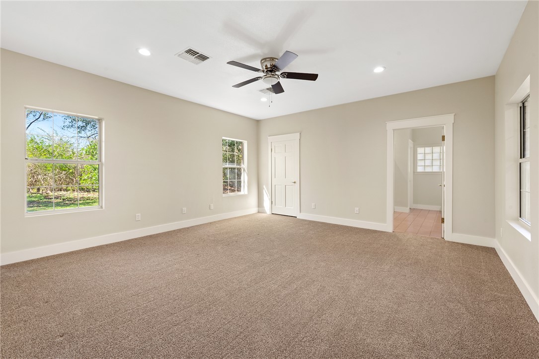 417 Morgan Street Franklin, TX 77856 - Photo 26 of 42 a view of a livingroom with a ceiling fan and window