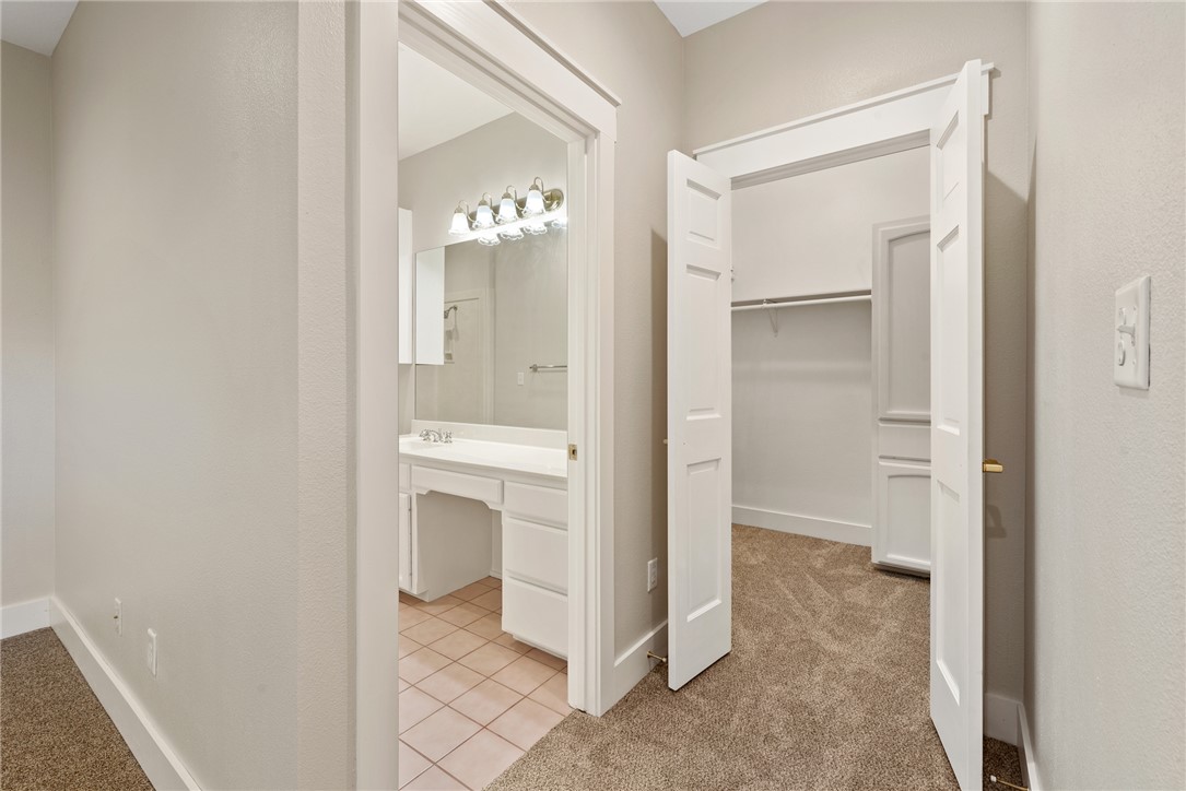 417 Morgan Street Franklin, TX 77856 - Photo 35 of 42 a bathroom with a sink and mirror