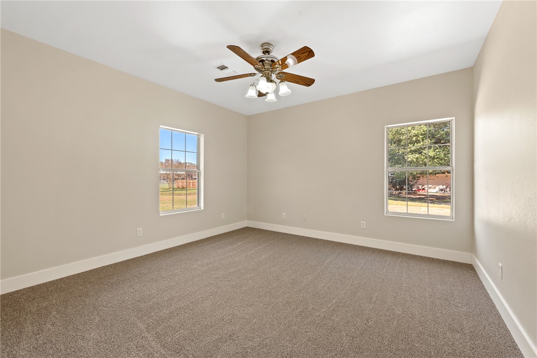 417 Morgan Street Franklin, TX 77856 - Photo 38 of 42 a view of an empty room with a window