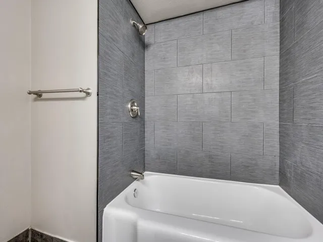 a bathroom with a bathtub