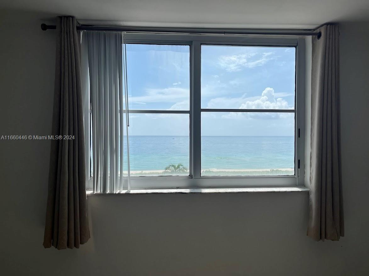 9273 Collins Avenue, Unit 811 Surfside, FL 33154 - Photo 7 of 25 a view of a window in a room