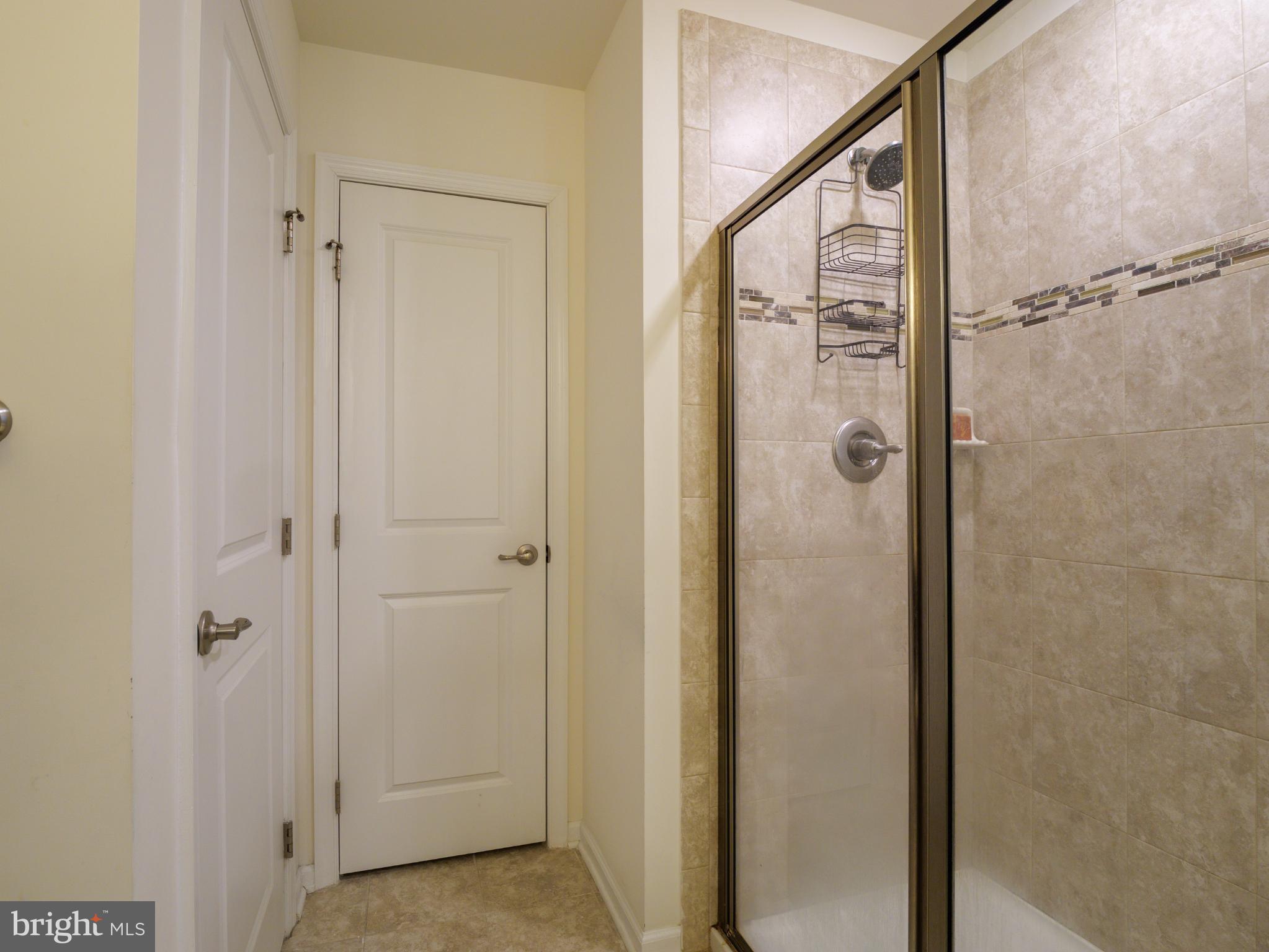 3412 St Marys View Road Accokeek, MD 20607 - Photo 23 of 47 Modern bathroom with sleek shower design.