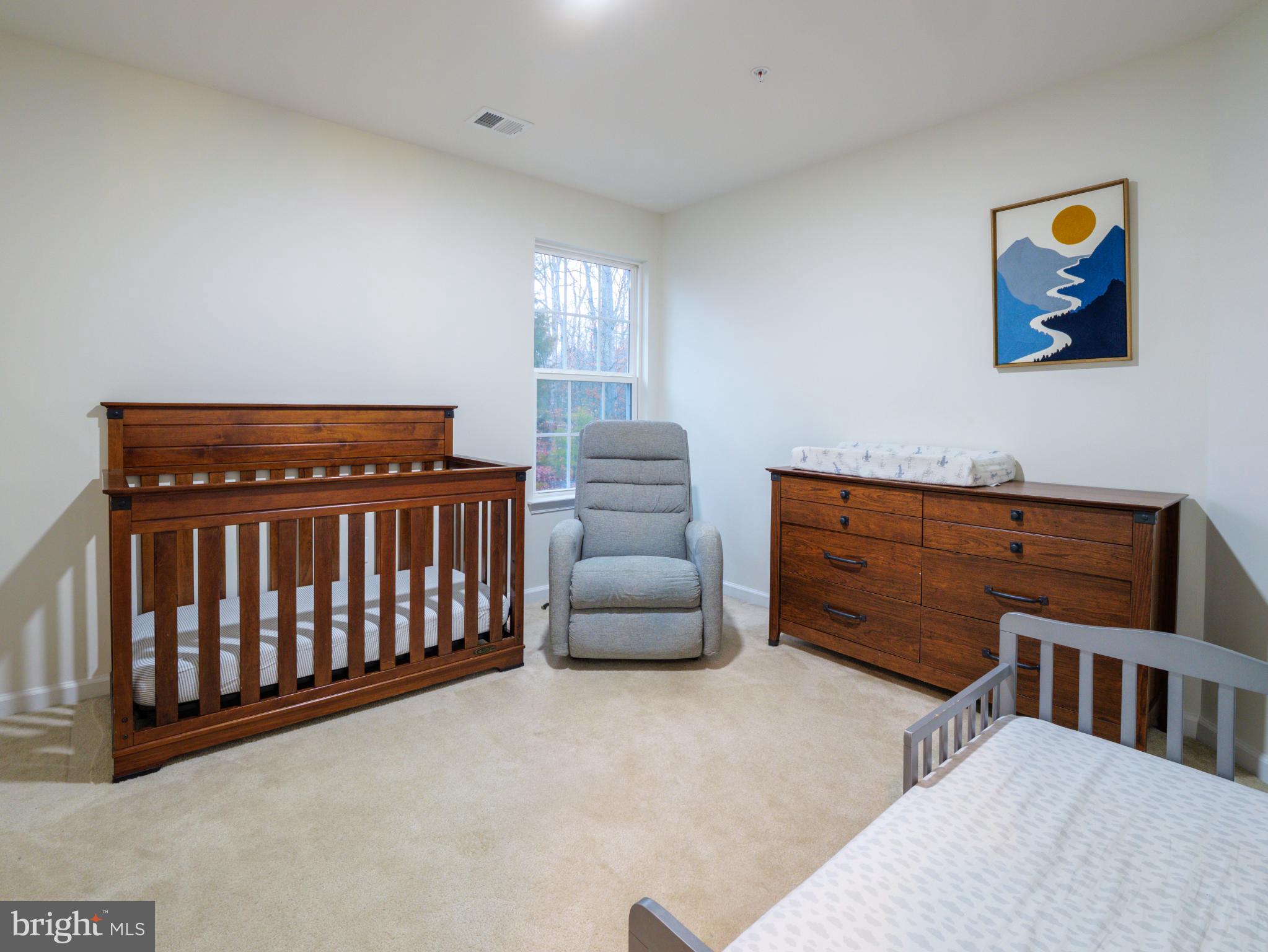 3412 St Marys View Road Accokeek, MD 20607 - Photo 27 of 47 Serene nursery with natural light and warmth.