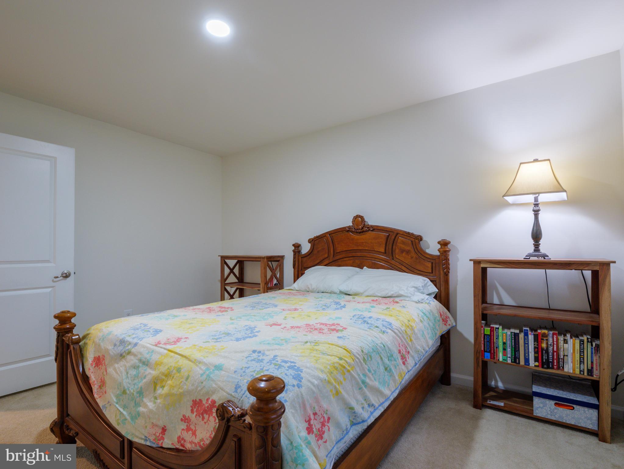 3412 St Marys View Road Accokeek, MD 20607 - Photo 32 of 47 Cozy bedroom with warm wooden accents.
