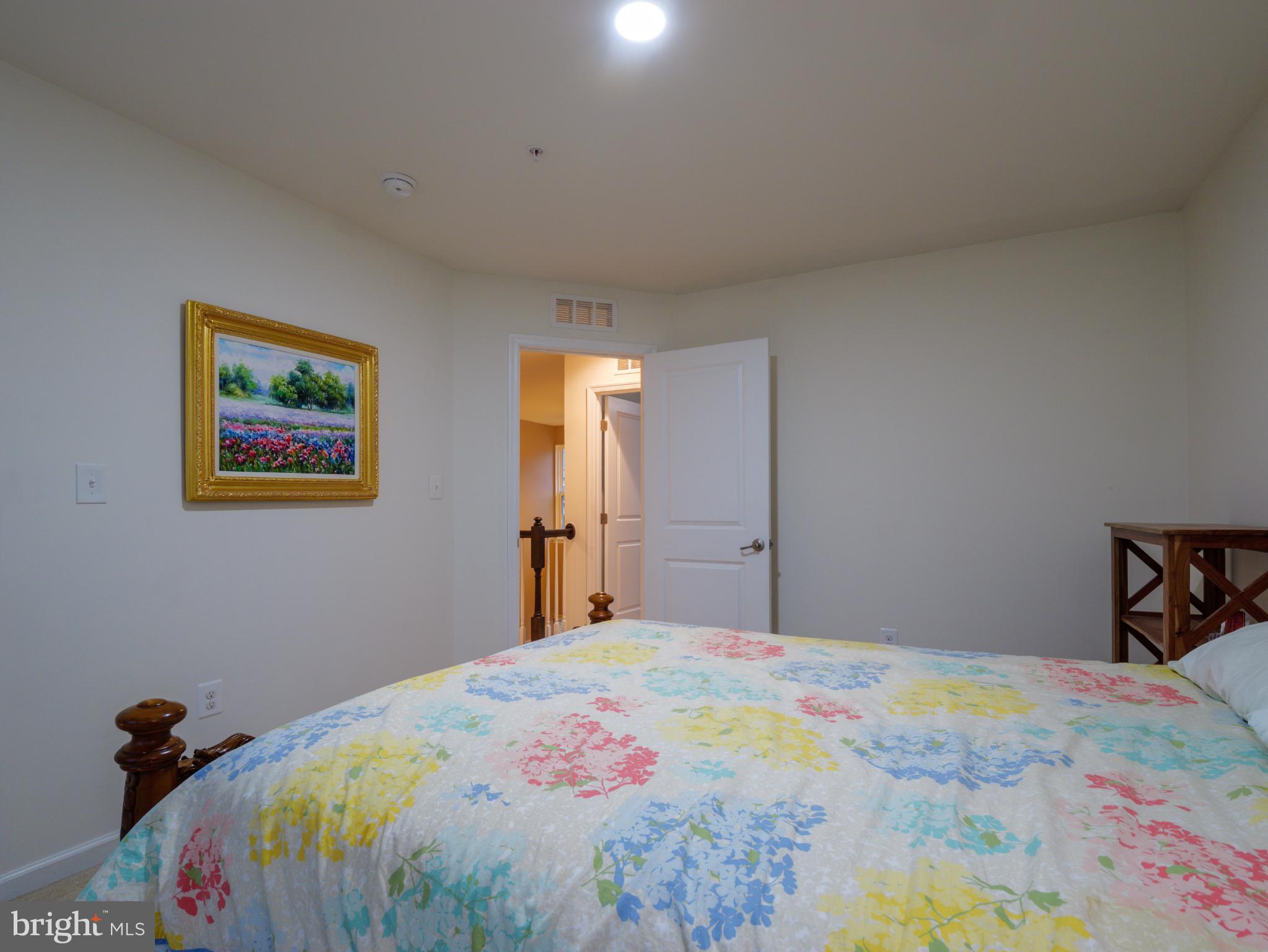 3412 St Marys View Road Accokeek, MD 20607 - Photo 33 of 47 Bright and inviting bedroom with floral accents.
