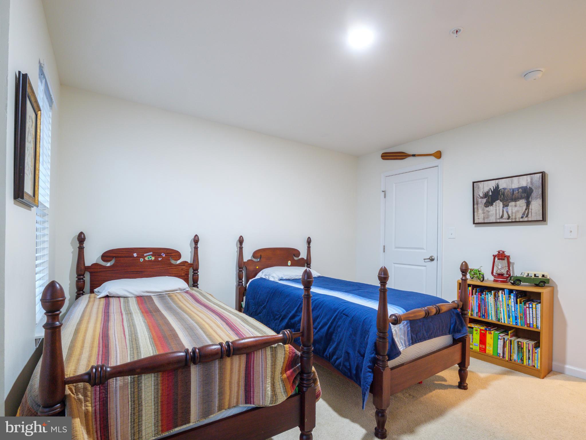 3412 St Marys View Road Accokeek, MD 20607 - Photo 36 of 47 Cozy twin bedroom with charming decor.