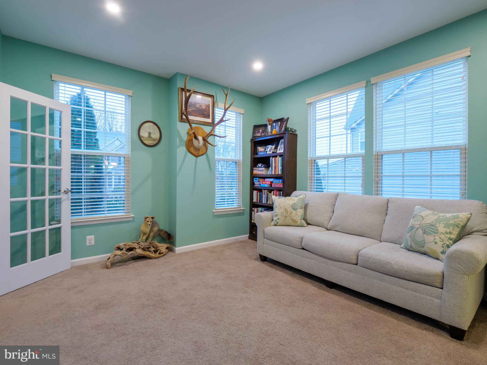 3412 St Marys View Road Accokeek, MD 20607 - Photo 7 of 47 Cozy retreat with vibrant teal walls.
