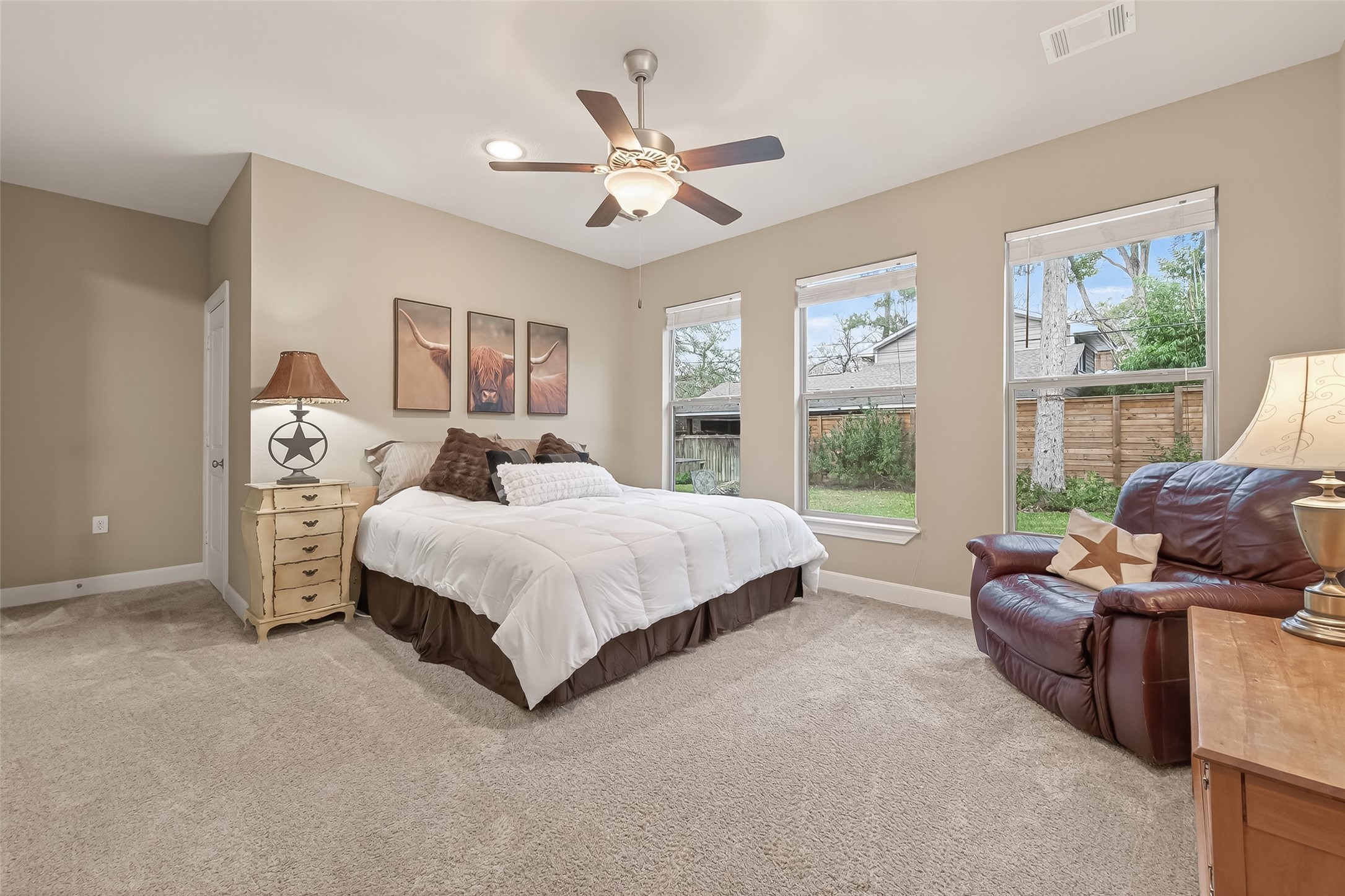 112 Timberside Drive Conroe, TX 77304 - Photo 18 of 50 Primary bedroom with so much natural light!