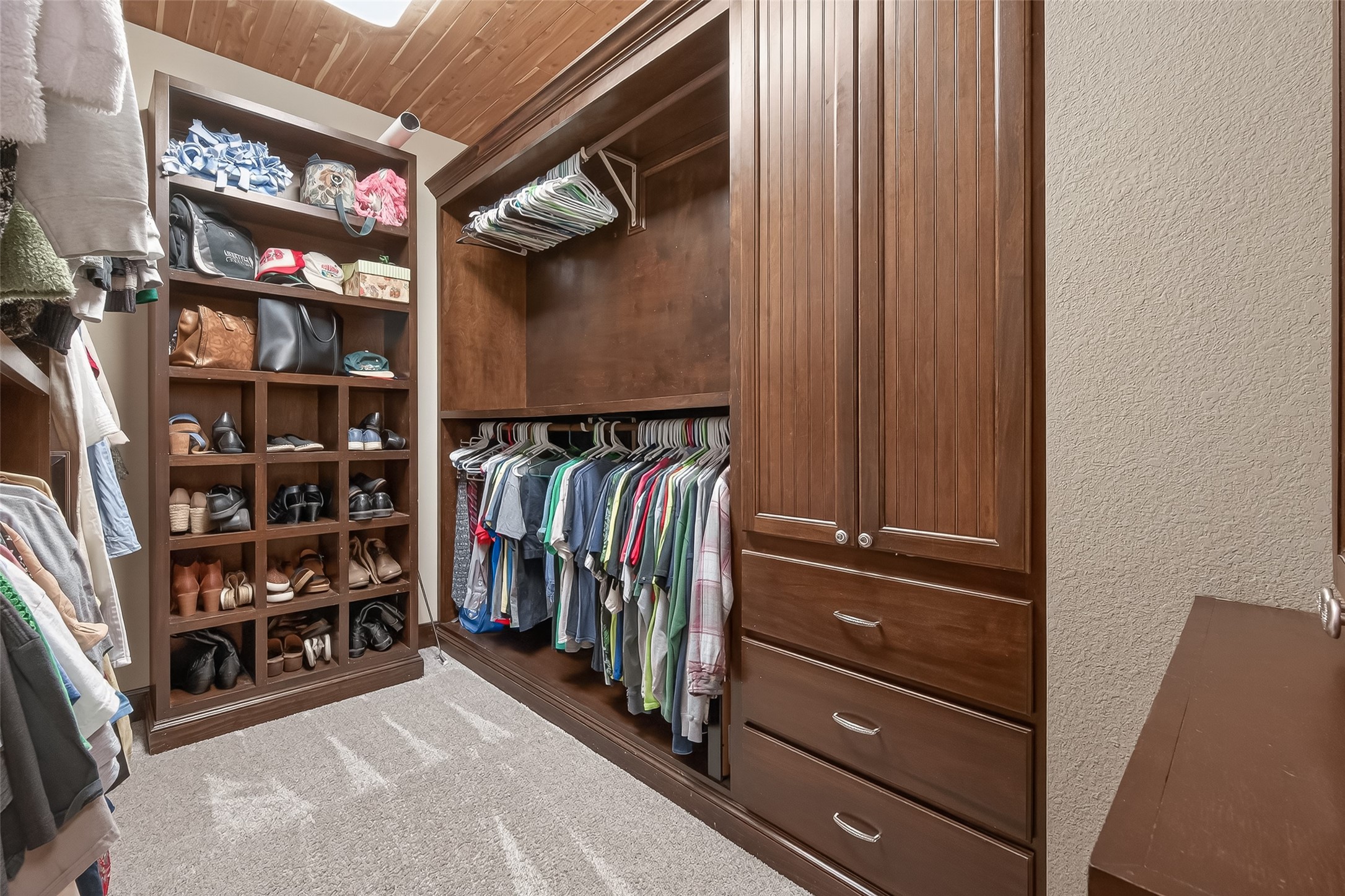 112 Timberside Drive Conroe, TX 77304 - Photo 20 of 50 a view of walk in closet with clothes and shoes