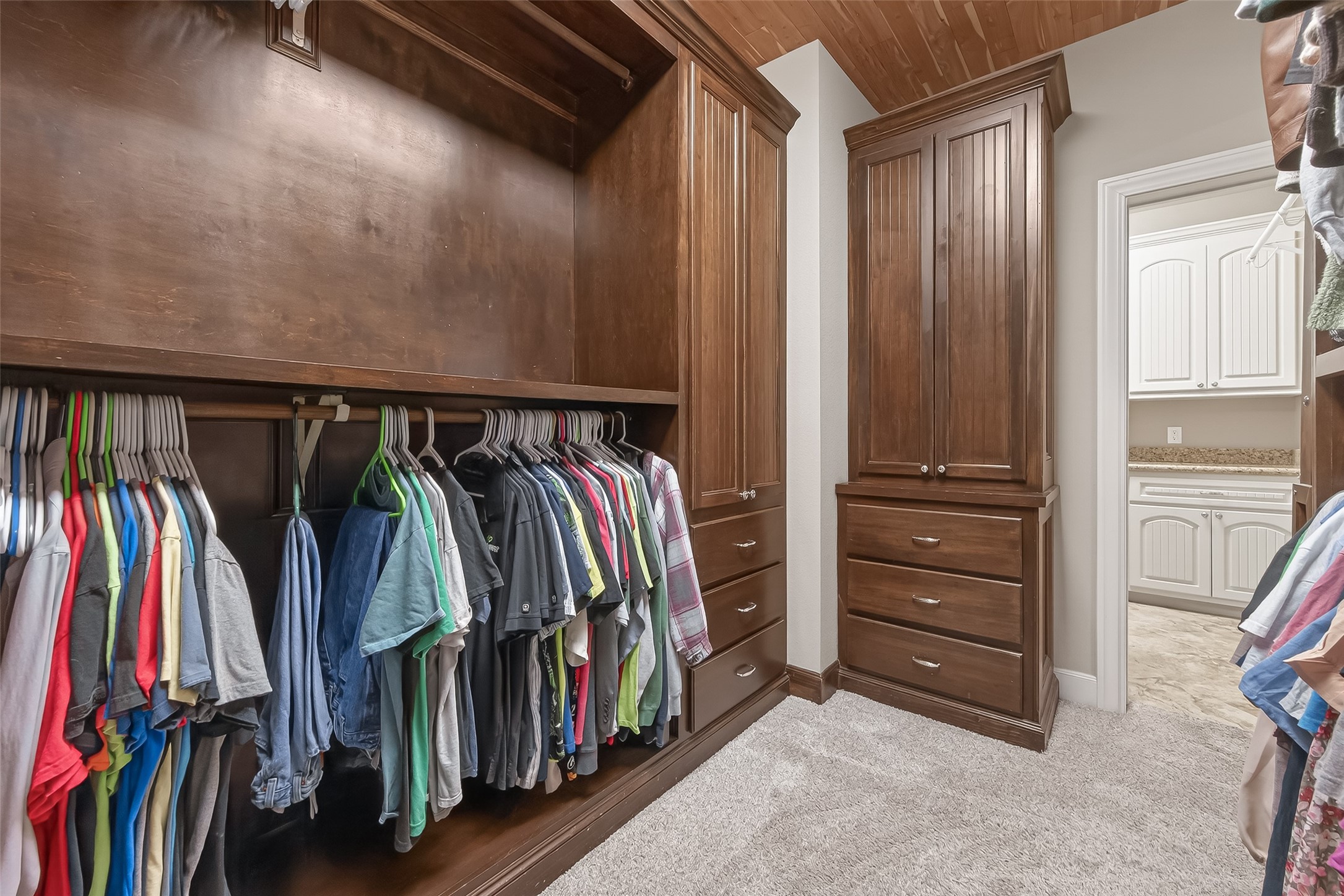 112 Timberside Drive Conroe, TX 77304 - Photo 21 of 50 a view of walk in closet with clothes