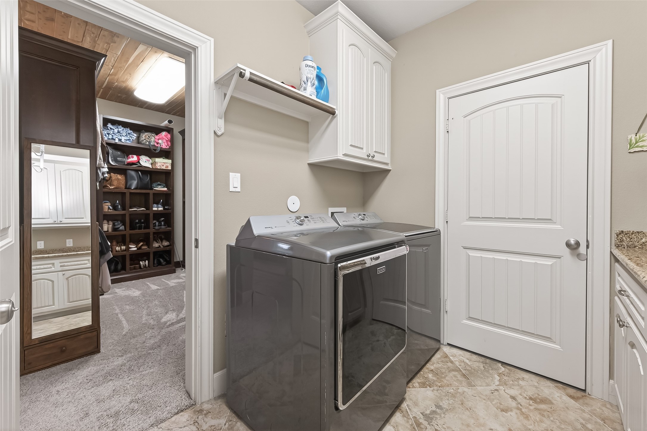 112 Timberside Drive Conroe, TX 77304 - Photo 22 of 50 a kitchen with stainless steel appliances granite countertop a refrigerator and a stove