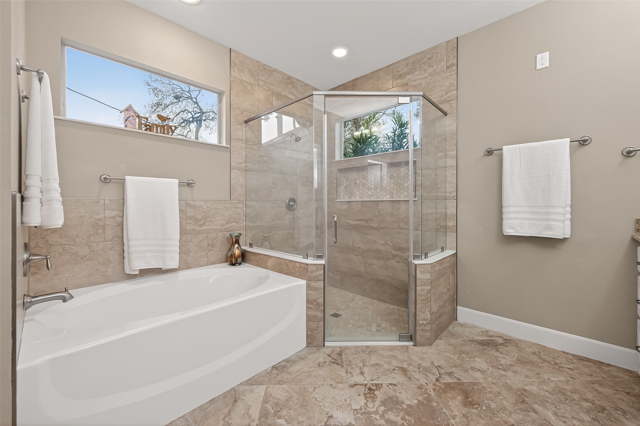 112 Timberside Drive Conroe, TX 77304 - Photo 24 of 50 a bathroom with a bathtub and shower