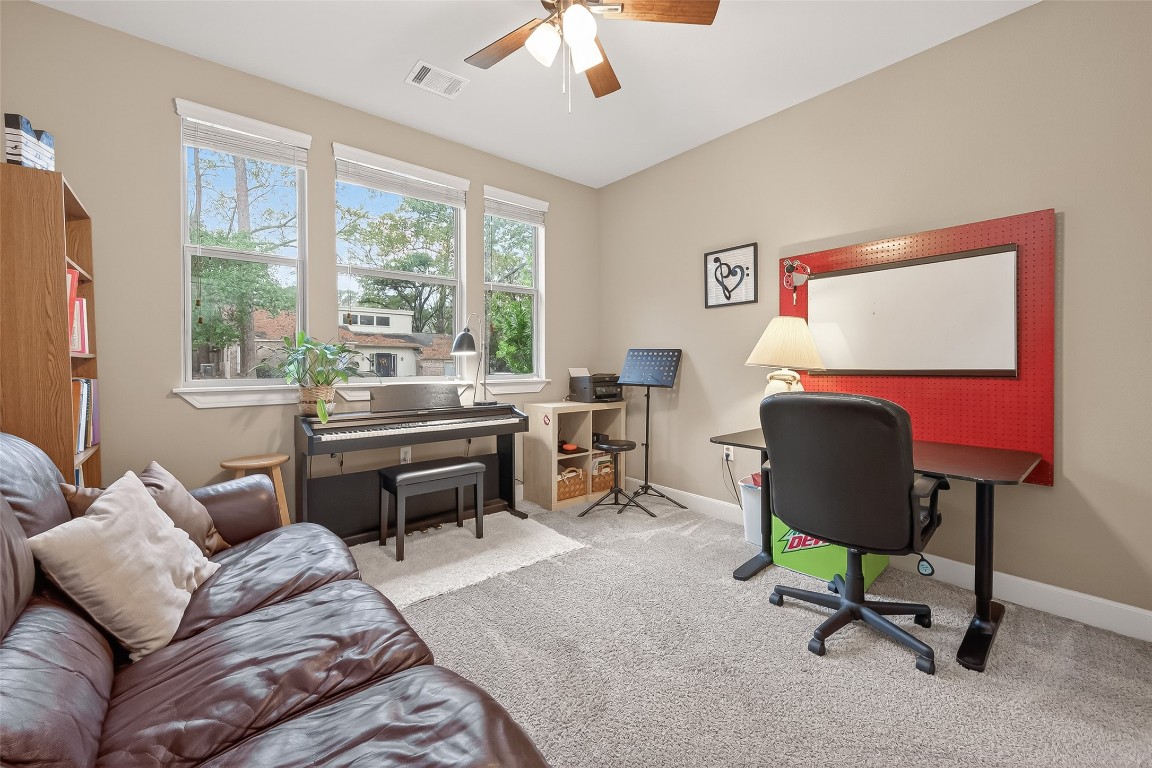 112 Timberside Drive Conroe, TX 77304 - Photo 31 of 50 Bedroom 3 being used as an office