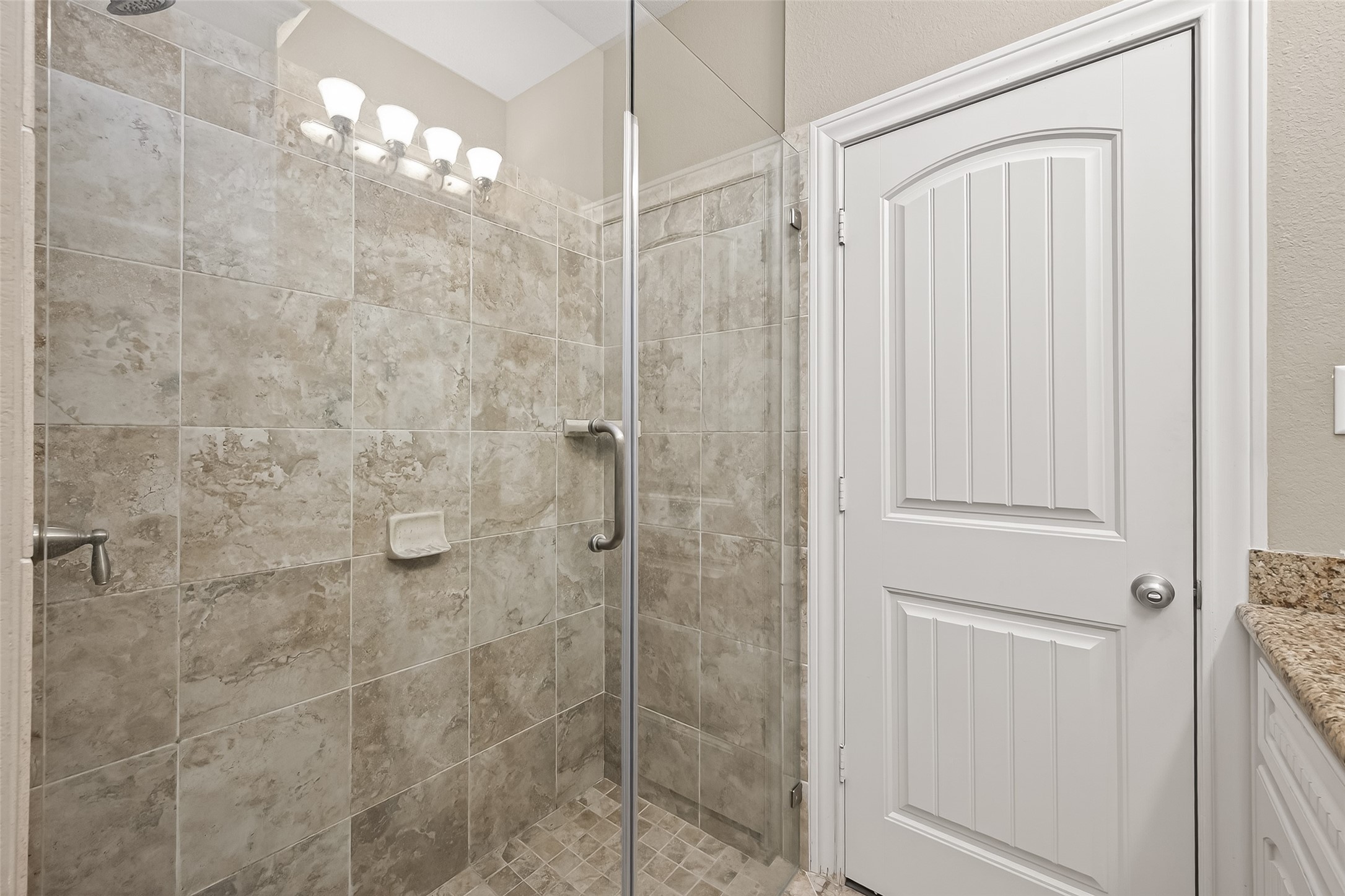 112 Timberside Drive Conroe, TX 77304 - Photo 35 of 50 New updated glass doors in secondary bathroom