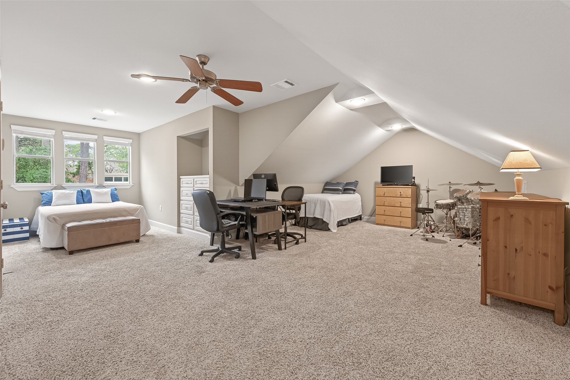 112 Timberside Drive Conroe, TX 77304 - Photo 37 of 50 a view of a livingroom with furniture and a window
