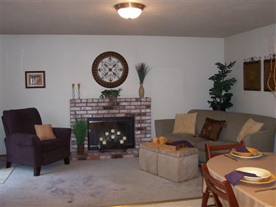 1138 Navarro Street Santa Rosa, CA 95401 - Photo 5 of 10 Kitchen and family room combination with brick fireplace. Sliding door off of the family room, great for BBQ's.
