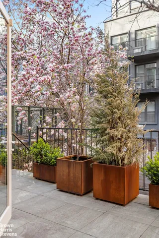 a bathroom with a sink toilet and mirror