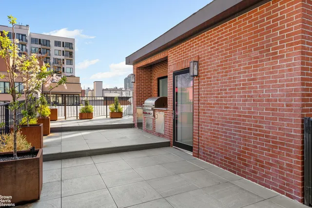 a large spacious bathroom with a tub shower and sink